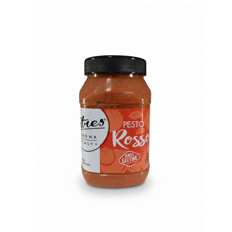 Grand pot transparent à couvercle noir contenant le Pesto Rosso Citres, sauce rouge intense à base de tomates séchées, avec étiquette orange illustrée de tomates, fabriqué à Vérone en Italie, sans gluten et sans conservateurs.