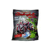 Emballage des bonbons réglisse italiens Ambrosoli Fior di Liquirizia, présentant des bonbons à la réglisse sans gluten typiquement italiens.