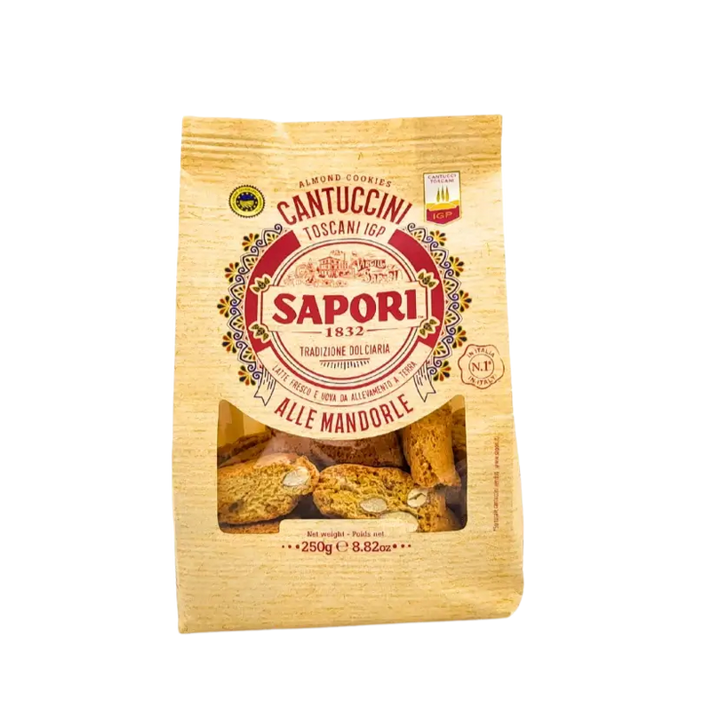 Face avant du paquet de Cantuccini Toscani I.G.P. aux amandes de la marque Sapori, 250g, avec fenêtre transparente laissant voir les biscuits.