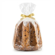 Pandoro italien aux pépites de chocolat emballé dans un sachet transparent avec ruban doré