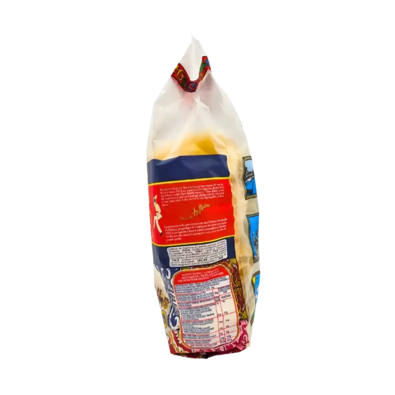 Emballage de pâtes paccheri Di Martino, 500g, vue latérale, authenticité de Gragnano, IGP, tradition napolitaine.