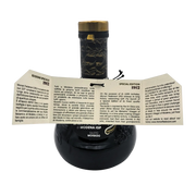 Texte informatif sur la qualité et la production artisanale du vinaigre balsamique de Modène IGP édition spéciale 1912.