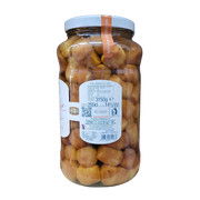 Informations nutritionnelles du baba au rhum Piemme, contenance 3150g, avec étiquette arrière montrant les ingrédients et le pourcentage d'alcool.