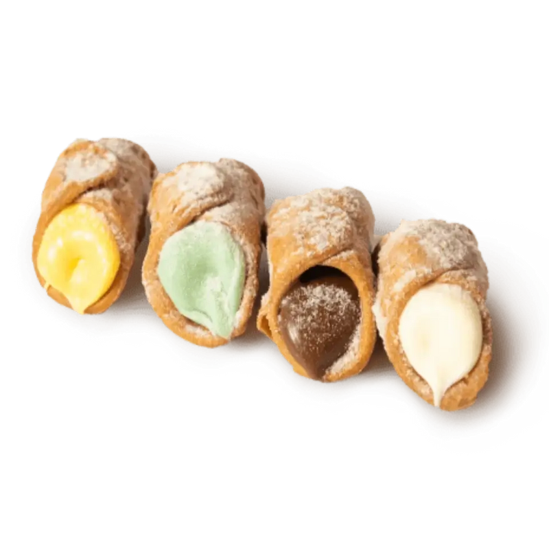 Quatre cannoli siciliens avec crème citron, pistache, chocolat et zabaione, enrobés de sucre glace