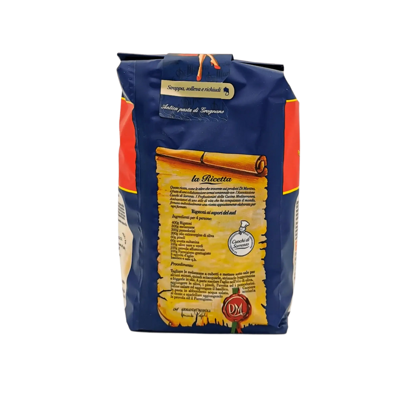 Face arrière de l'emballage des Rigatoni Pastificio Di Martino 500g avec la recette et les instructions de cuisson.