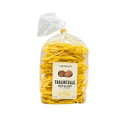Pâtes artisanal Pirro 250g - tagliatelle truffe noire dans un sac transparent, illustrant la qualité italienne avec arôme de truffe.