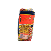 Côté gauche du paquet de Tortiglioni Pastificio Di Martino 500g - Informations nutritionnelles et aperçu des pâtes à travers la fenêtre transparente.