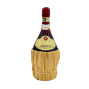 Bouteille de Vin Chianti DOCG Toscane en fiasque en paille de 75cl, rouge italien avec étiquette dorée.