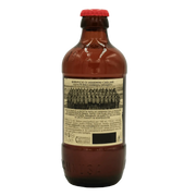 Bouteille de bière Ichnusa Non Filtrata 33cl, vue arrière, informations sur la recette et l'origine de la bière non filtrée de Sardaigne.
