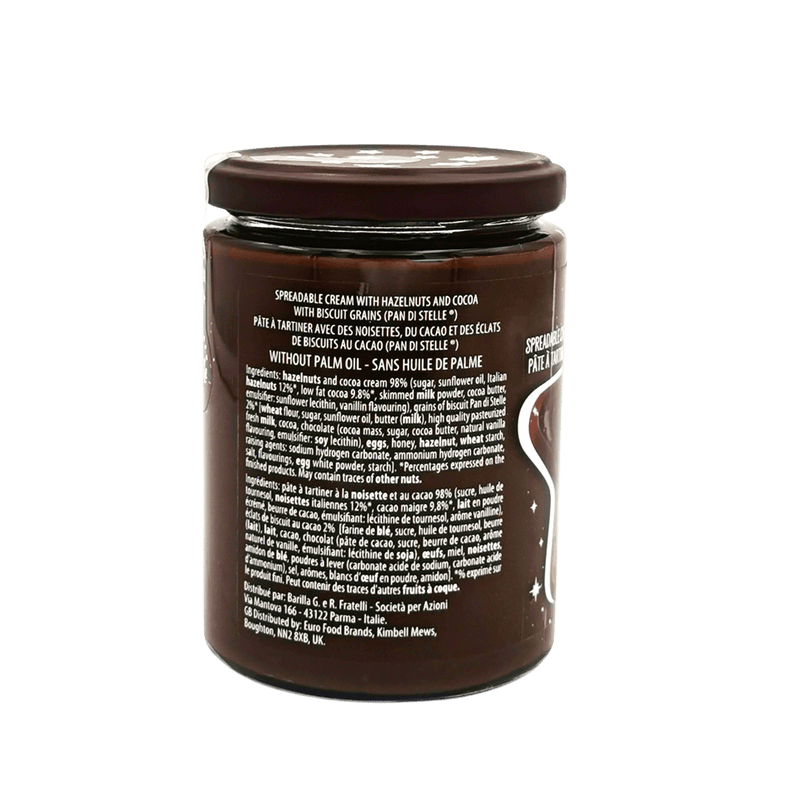 Pot de pâte à tartiner Pan di Stelle Barilla 380g avec éclats de biscuits et étiquette décrivant les ingrédients sans huile de palme.